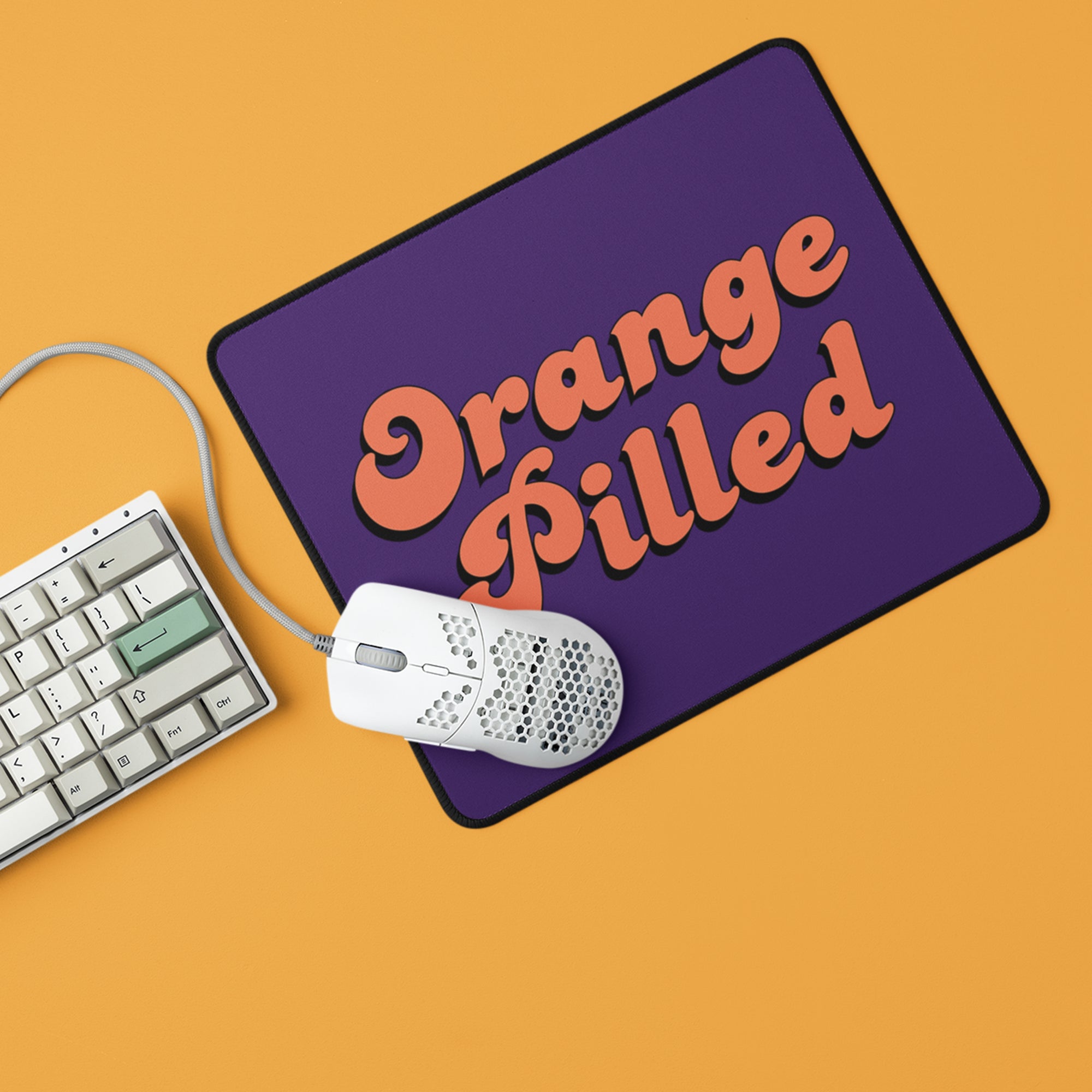 Bitcoin Accessories - Orange Pilled Mouse Pad displayed with keyboard and mouse.