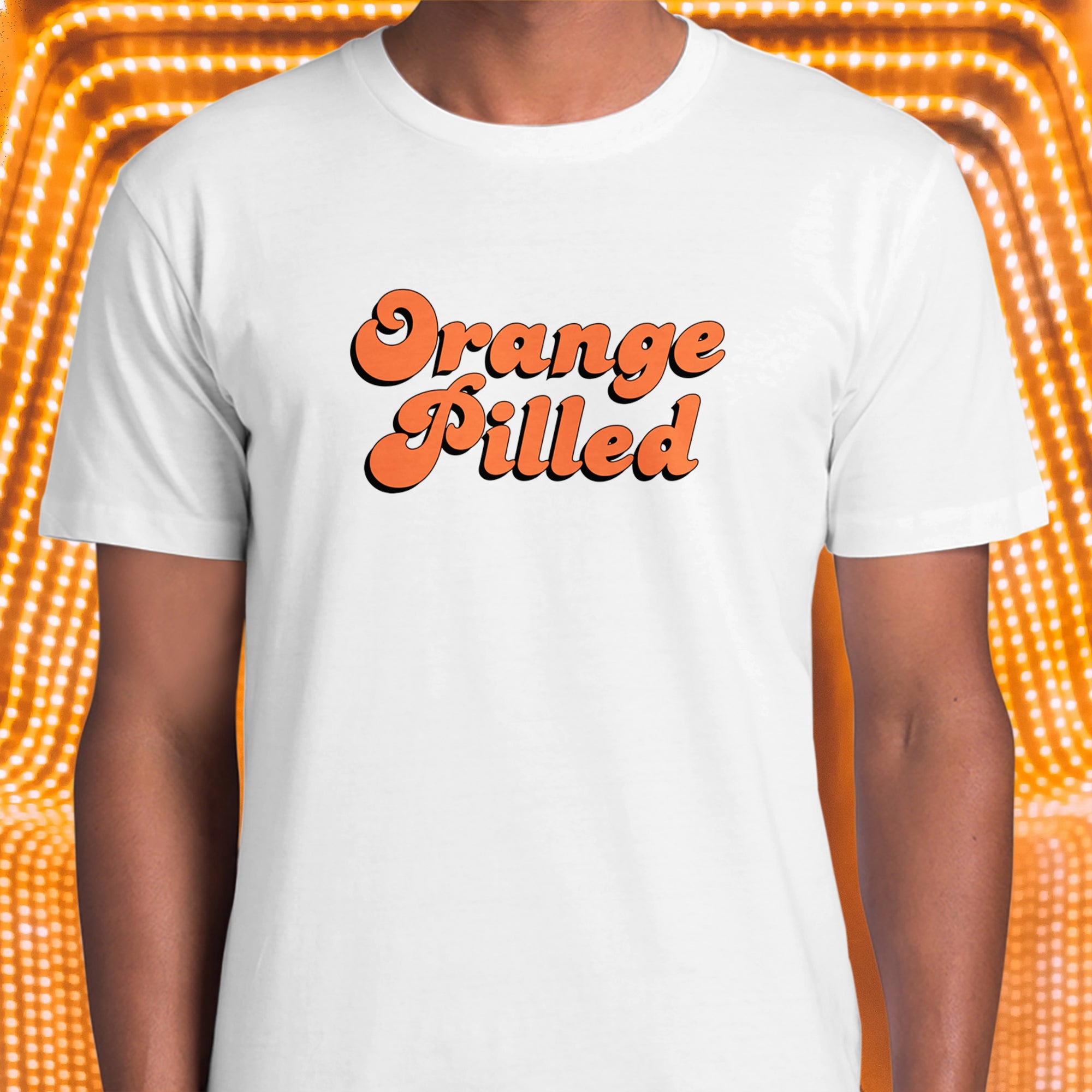 Bitcoin Apparel - Orange Pilled T-Shirt features a retro logo. Color: White. Model image. Front view. 