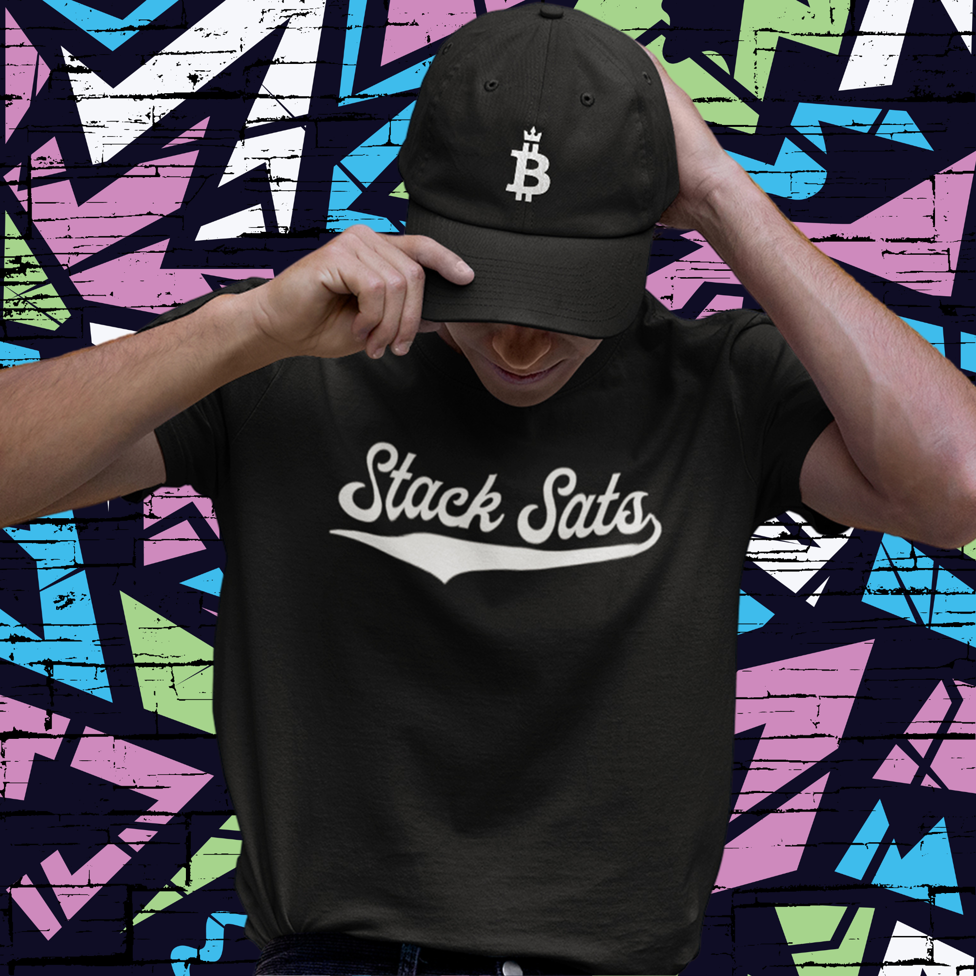 Stack Sats Shirt and Bitcoin Dominance Cap worn by male model. Front view.