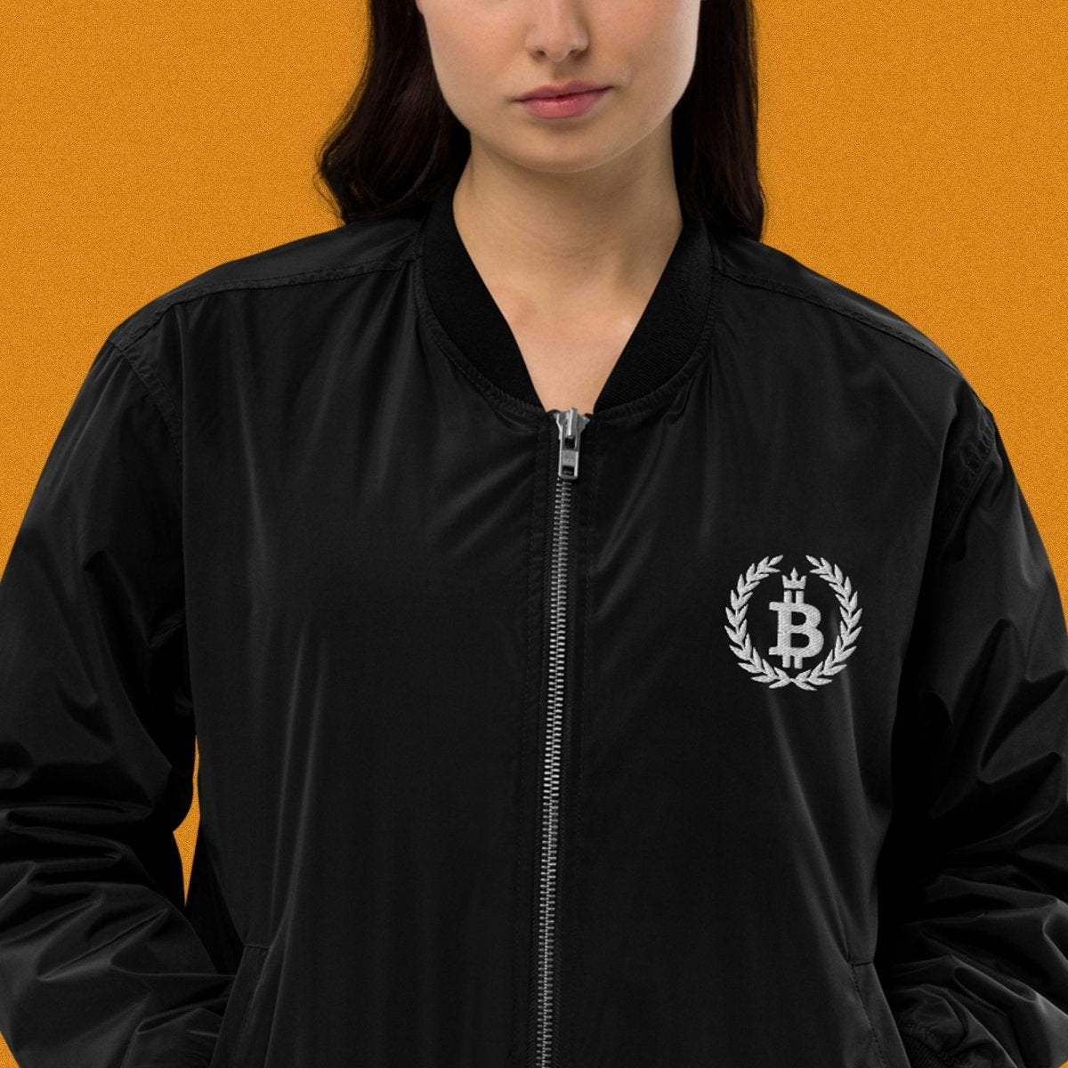 Bitcoin Merch - Bitcoin Dominance Bomber Jacket worn by female model (front view). 