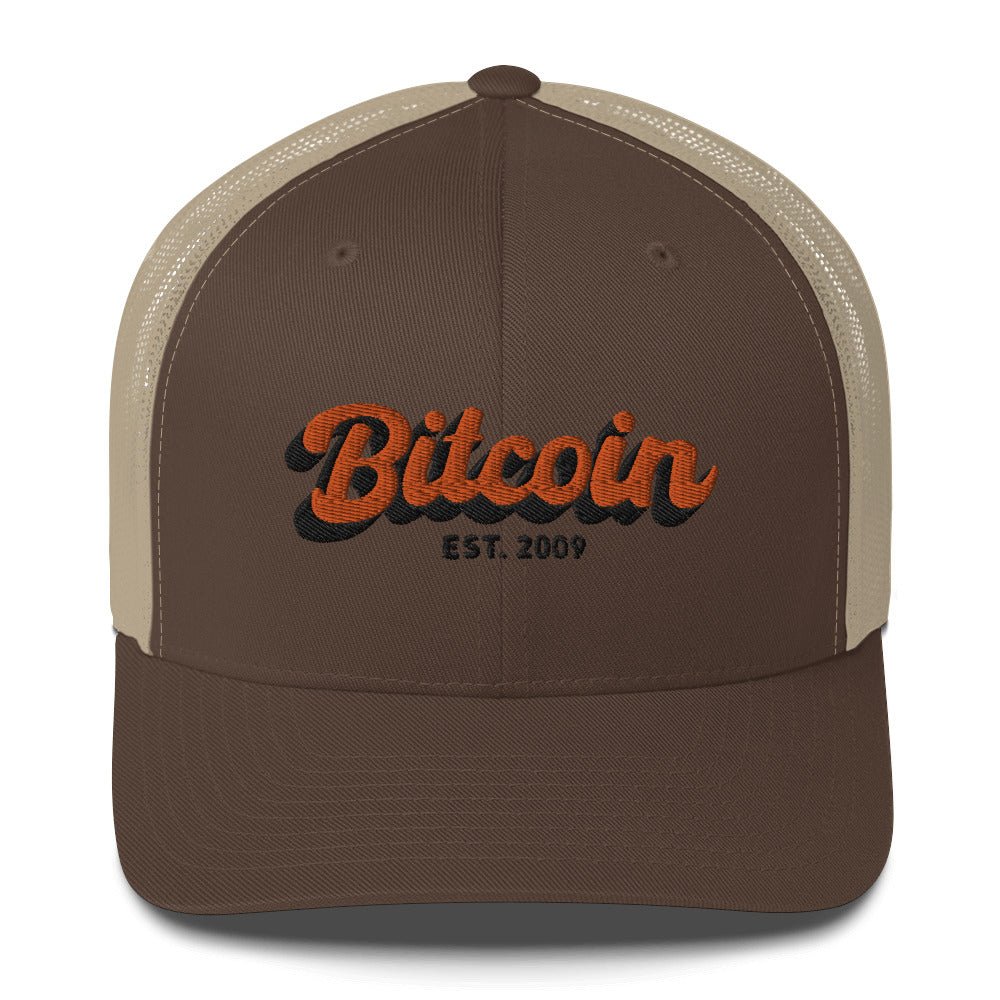 Bitcoin Headwear - The Bitcoin Est. 2009 Trucker Hat features a bold retro-style design. Color: Brown/Khaki. Front view.